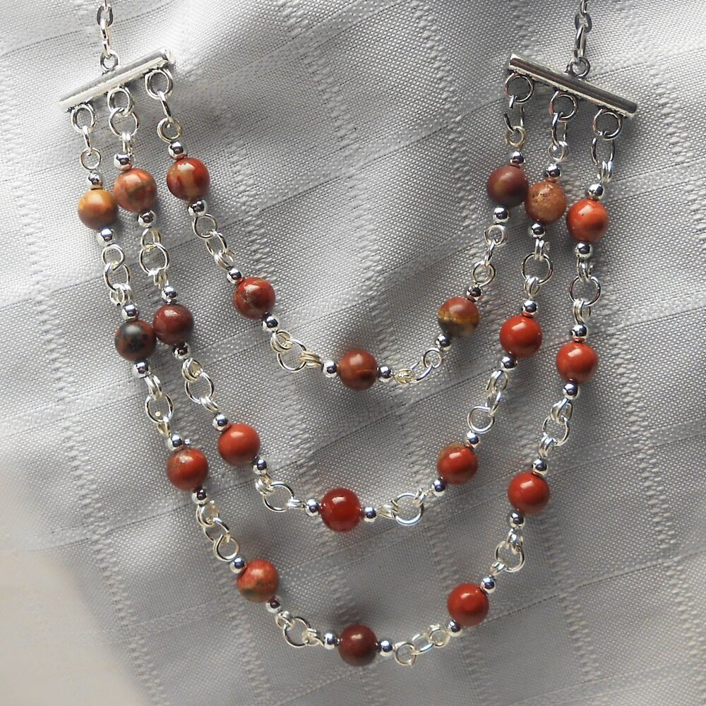 No 203 Beautiful handmade necklace with several rows and earrings